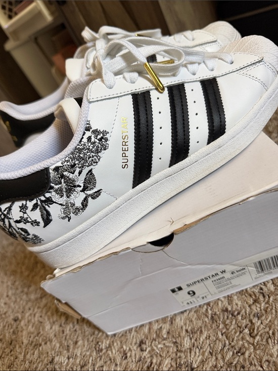 adidas Shoes - adidas White Leather Sneakers with Black Stripes & Floral Detail